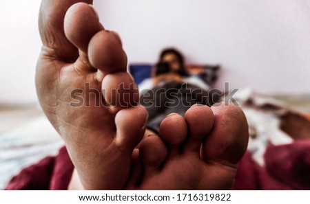 Young man doing timepass alone in the room beacuse for lockdown