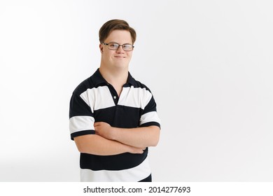 Young man with down syndrome smiling and looking at camera isolated over white background - Shutterstock ID 2014277693