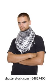 Young Man Dressed In Black T-shirt At The Neck Of A Palestinian Scarf. Hands Crossed On His Chest