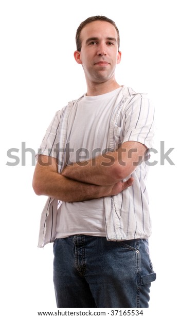 A young man dressed in casual clothing is standing with his arms crossed, isolated against a white background