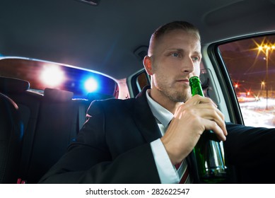 Young Man Drinking Beer And Pulled Over By Police