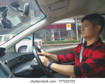 Young Man Drive A Car, Safety First.