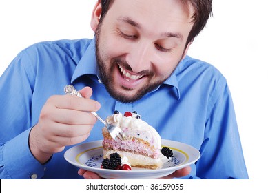 Young Man Eating Colorful Cake, Isolated