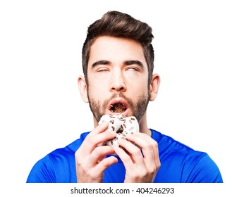 Young Man Eating A Donut