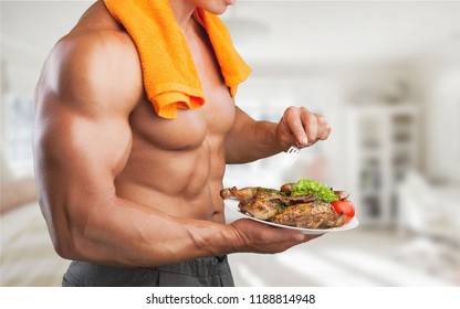 Young Man Eating A Healthy Fruit Salad