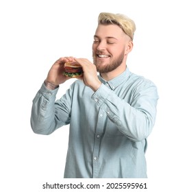 Young Man Eating Vegan Burger On White Background