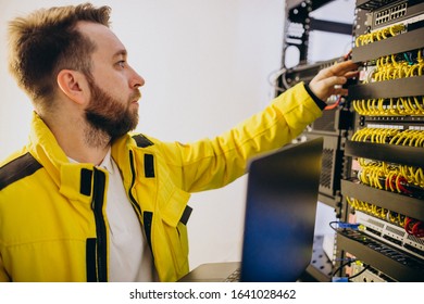 Young man engineer making program analyses