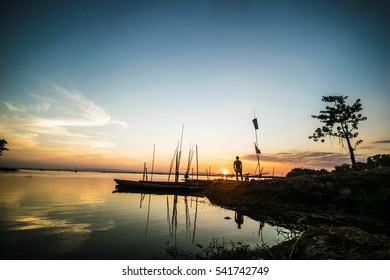 Young man exercise on the beautiful sunset in the river-03 - Powered by Shutterstock