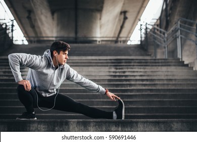 Young man exercise in urban environment