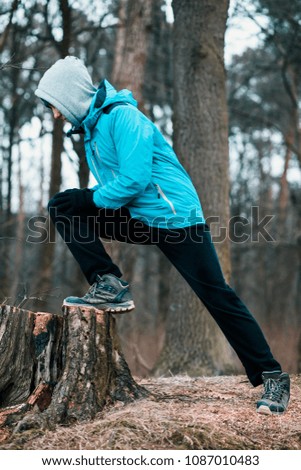 Image, Stock Photo Young man exercising outdoors in a forest