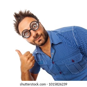 Young Man With Expression Of OK And Thick Glasses On White Background.