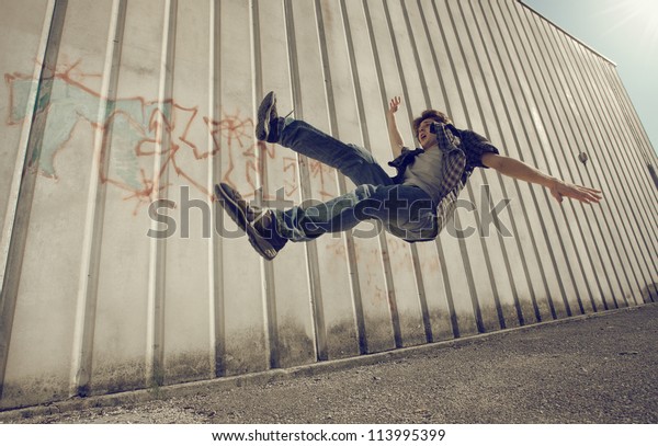 Young Man Falling Building Stock Photo (Edit Now) 113995399