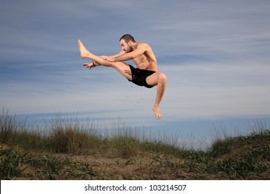 young man fighter exercising outdoor,motion blur - Powered by Shutterstock