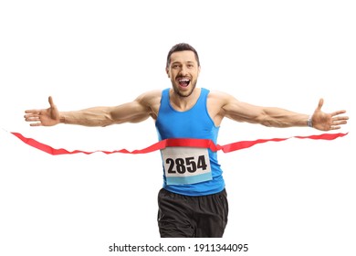 Young man finishing a marathon race on the finish line isolated on white background