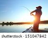 fisherman boat sunset