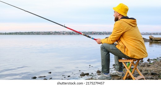 Young Man Fishing On River