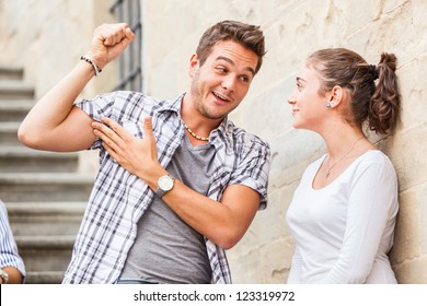 Young Man Flirting With A Girl