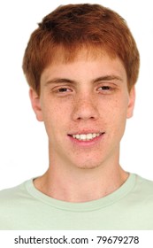 Young Man With Freckles On White Background