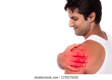 Young Man Get Hurt, Pain And Suffering In Shoulder, Touching His Shoulder With Red Dot, Isolated On White Background, Copy Space. Handsome Guy Get Pain Shoulder Because Chronic Myositis Pain Syndrome