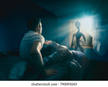 Young man getting abducted by an Alien / high contrast image