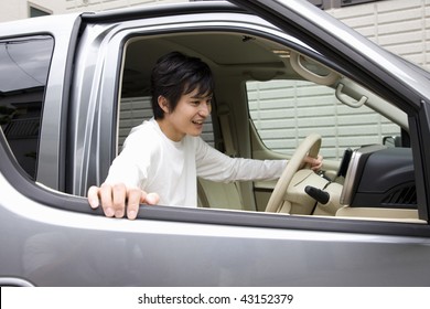 A Young Man Getting Into The Car