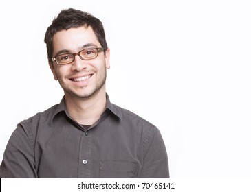 Young man with glasses smiling isolated on white background