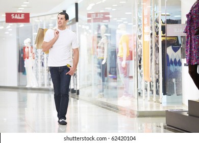 A Young Man Goes Shopping With The Store