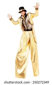 Young Man In Golden Cloth Staying On Stilts