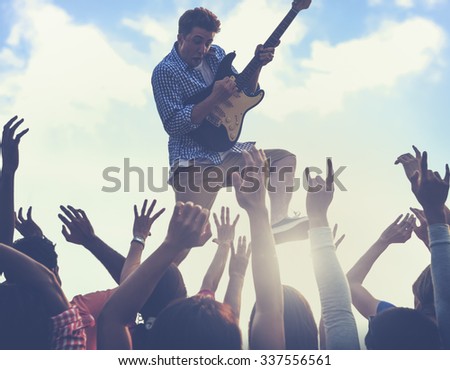 Young Man Guitar Performing Concert Concept