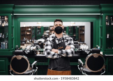 Young Man Haidresser In Barber Shop, Coronavirus And New Normal Concept.