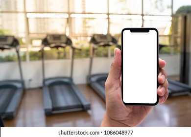 Young Man Hand Holding Smartphone In Gym To  Fitness Phone Fitness Exercise Concept