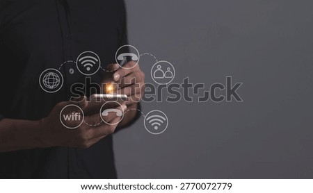 Young man hand using smartphone to Interconnect, Interconnected Concept; People connect via wireless internet in a world of digital technology and communications that connect