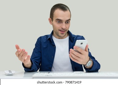 Young Man Happy Looking At Your Phone, Front View, Isolated, Background