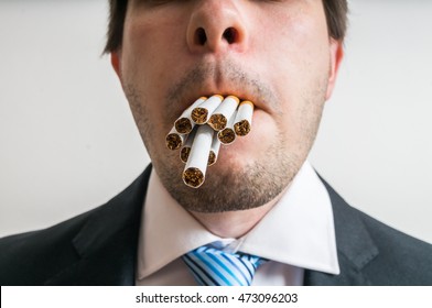 Many Cigarettes in Mouth Images, Stock Photos & Vectors | Shutterstock