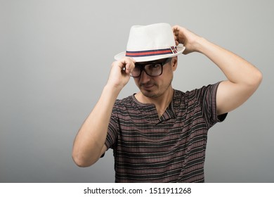 young man in a hat
