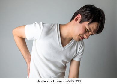 Young Man Having A Backache