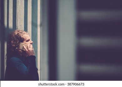 Young Man Having Difficult Phone Conversation