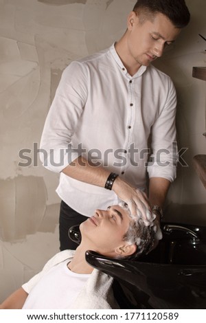 Similar – Image, Stock Photo Caregiver helping elderly female patient to get out of bed