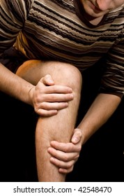 Young Man Having Knee Pain