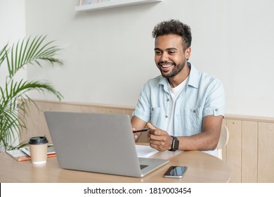 Young man having meeting online. Student men using laptop computer at home. Working, studying, distance education, communication online, social distancing, meeting online concept