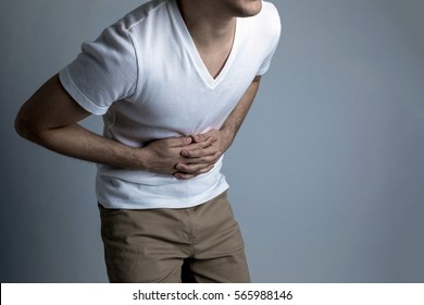 Young Man Having A Stomachache