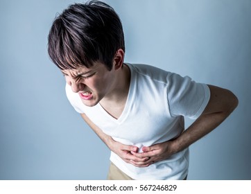 Young Man Having A Stomachache