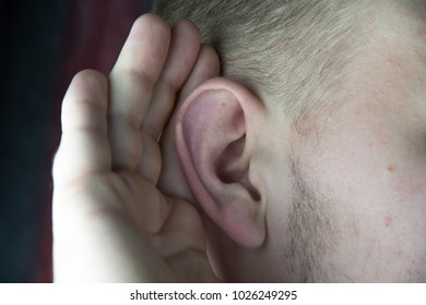 Young man with hearing problems