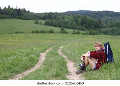 Young Man Is Hiking In Low Mountains In The Middle Of Nowhere In Eighties.