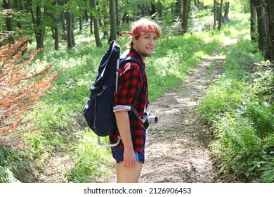 Young Man Is Hiking In Low Mountains In The Middle Of Nowhere In Eighties.