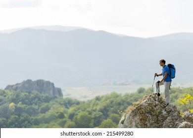 Young Man Hiking On The Mountain