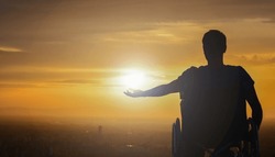 Young Man With His Hand To The Sun