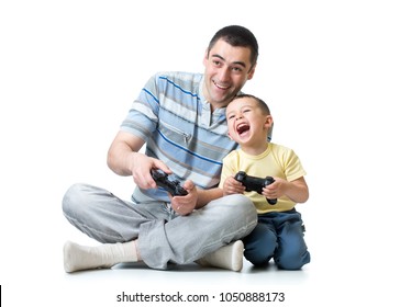 Young Man And His Kid Son Playing Videogame At Home