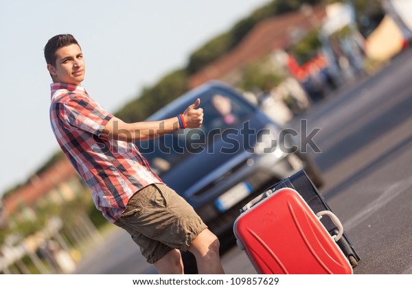 Young Man\
Hitchhiking