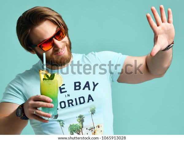 Young Man Hold Blue Hawaiian Margarita Stock Photo Edit Now 1065913028